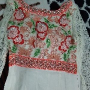 Heavy party wear suit with pant and dupatta.